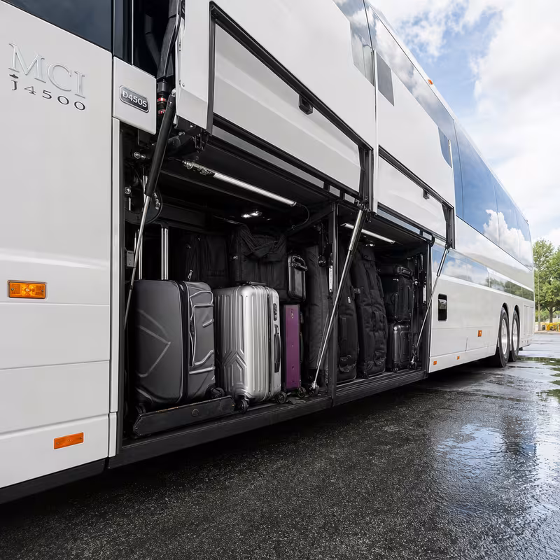 Party bus interior with wraparound leather seating and LED lighting in Fort Wayne