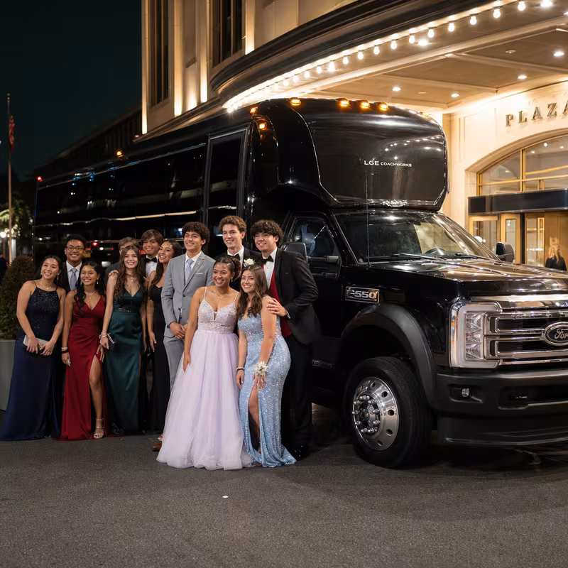 Party bus interior with wraparound leather seating and LED lighting in Fort Wayne