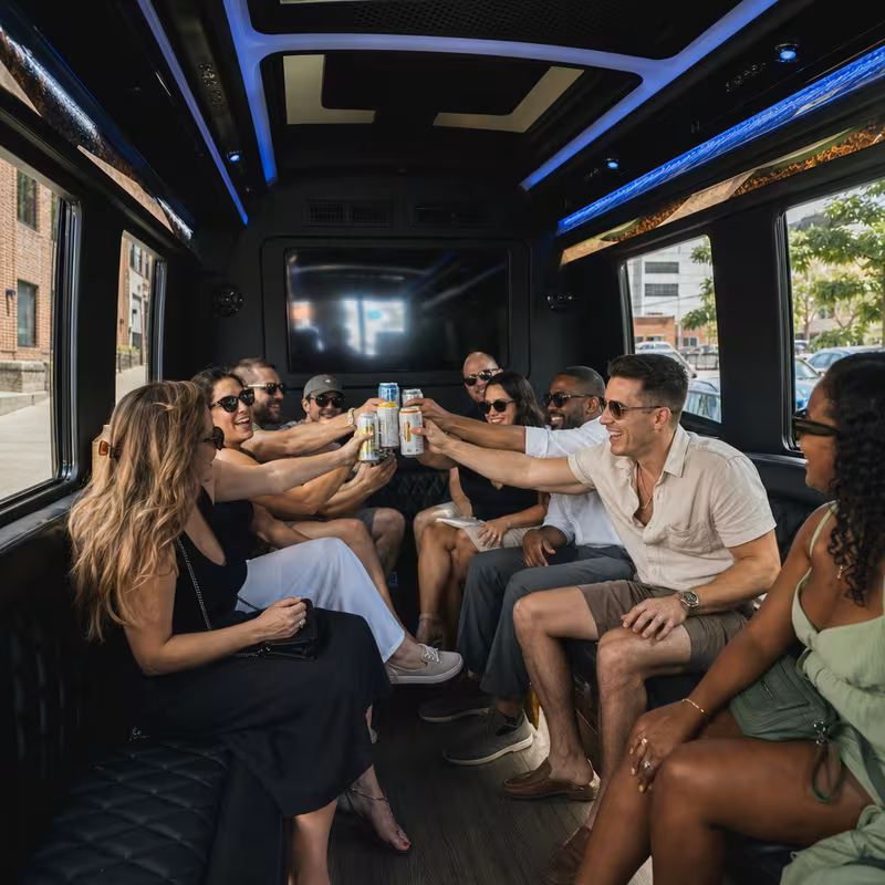 Group boarding a white charter bus for Winery & Brewery Tour Transportation transportation in Fort Wayne